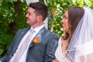 a man and woman smiling